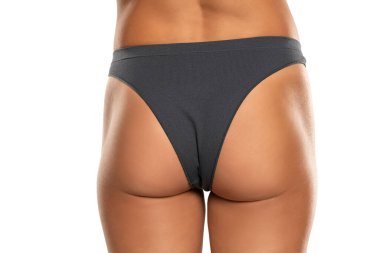 Cropped close-up rear back behind view of nice thin fit babe lady girlfriend wife posing perfect flawless round sportive curvy line figure panties off isolated over white studio background