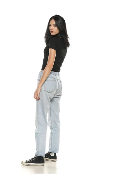 Young Beautiful Woman Loose Jeans Posing White Studio Background — Stockfoto
