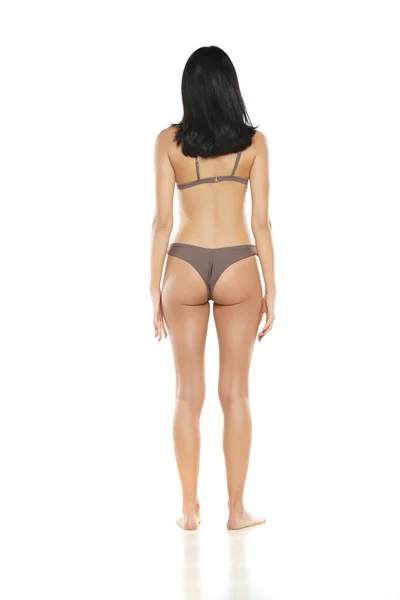Achteraanzicht Van Een Jonge Brunette Vrouw Bikini Badpak Poseren Een — Stockfoto