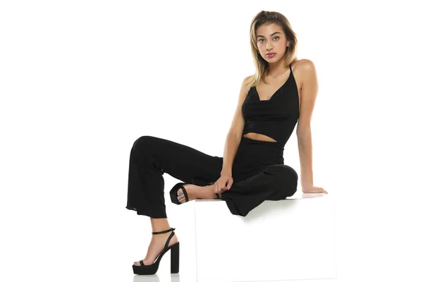 Young Woman Black Wide Trousers Bra Sitting White Studio Background — Stock Photo, Image