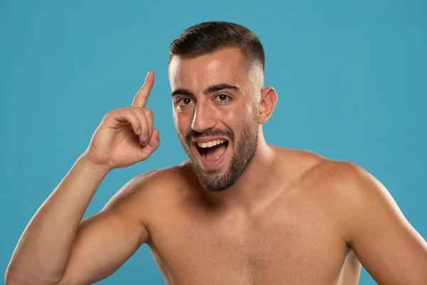 Young Happy Shirtless Caucasian Man 20S Holding Index Finger Great — Stock Photo, Image