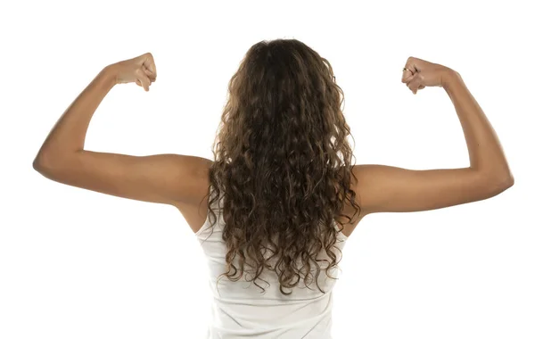 Achteraanzicht Portret Van Een Fitness Vrouw Tonen Haar Biceps Een — Stockfoto