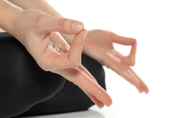 Close up hands. Woman do yoga relax on white studio background. Healthy and Yoga Concept