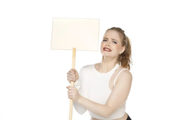 Young Blonde Unhappy Woman Holding Blank Sign White Studio Background — Stock Photo, Image