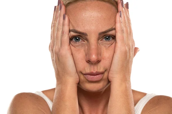 Middle Aged Blond Woman Squeezes Her Face Skin Her Hands — Stock Photo, Image
