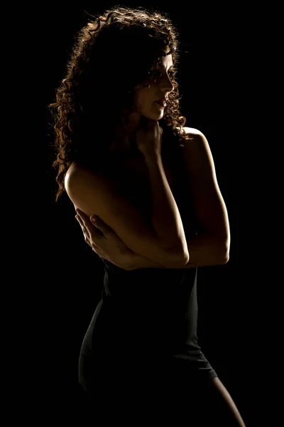 Enigmatic Elegance Curly Haired Woman Silhouette Dark Studio Background — Stock Photo, Image