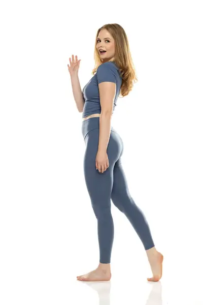 Full Body Side View Young Woman Sportswear Walking White Studio — Stock Photo, Image