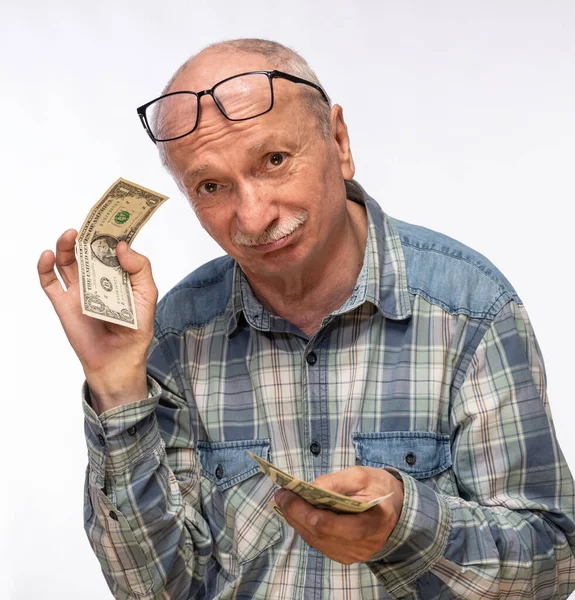 Старший Человек Держит Деньги Долларах Белом Фоне — стоковое фото