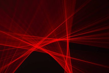 Siyah arkaplanda ışıkla çizilmiş soyut kırmızı çizgiler. Lazer hatları