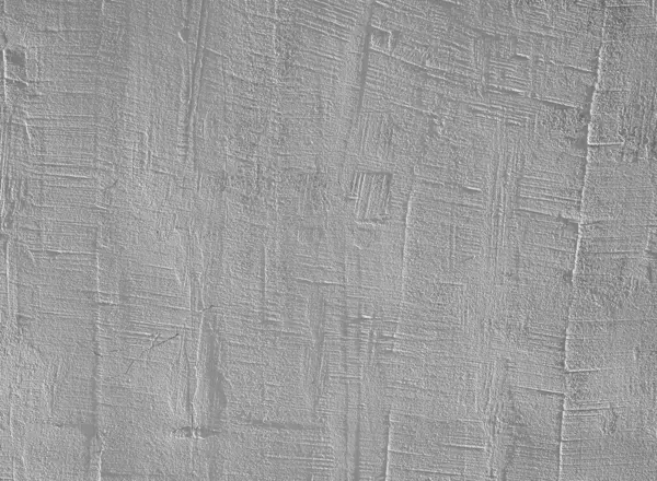 Yumuşak ve doğal ışıkla aydınlatılmış desenli beton duvarlar çeşitli desenler ve renkler sergiler. Yüzey, derinlik ve karakter ekleyen çatlaklar ve benzersiz tasarımlar içerir.