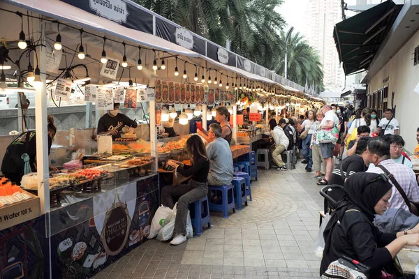 stock image Bangkok, Thailand:March5,2023- Crowded of tourists walk and buy the delicious food in the street food fair 