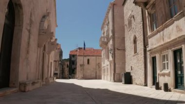 Drone shot of the Old town main square in front of the cathedral in Korcula in Dalmatia region, Croatia