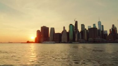Time lapse 4k view of Lower Manhattan sunsetting, New York USA.