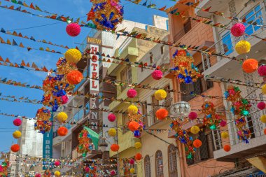 AJMER, INDIA - MARCH 3 2018: Colorful scene of hotels on the Dargah Bazar road of the old city center.