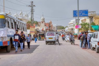 PUSHKAR, INDIA - MARCH 3 2018: Colorful scene of beautiful people on the street of the Holy City.