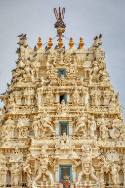 PUSHKAR, INDIA - MARCH 3 2018: Decorative detail on the roof of the Shree Rma Vaikunth Mandir temple.