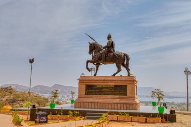 AJMER, INDIA - MARCH 3 2018: Maharana Pratap Smarak bronze sculpture of a historical figure at the Pearl hill viewpoint above the city.