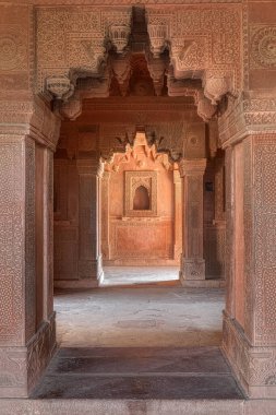 FATEHPUR SIKRI, INDIA - MARCH 4 2018: Temple interior at historical remains of Panch Mahal in Uttar Pradesh. clipart