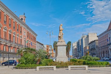 BARI, ITALY - September 26, 2019 Statue of Niccolo Piccinni at the Teatro Piccinni in city center. Sculpture by Gaetano Fiore. clipart