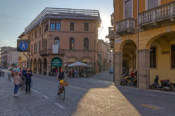 stock image PADUA, ITALY - APRIL 03 2023: An old building with a restaurant and tables on the street in Via Beato Luca Belludi.