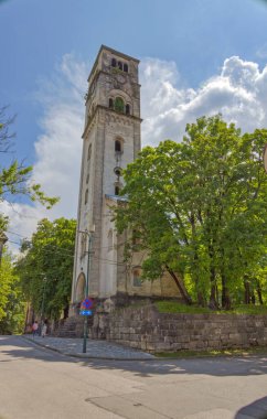Bihac, Bosnia and Herzegovina - June 2, 2023: Panoramic view of the city center featuring the tower of St. Anthony of Padua Church.