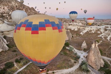 Balloons in rose valley, Cappadocia. Spectacular flight in Goreme. Turkey