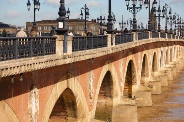 Historic bridge of Pont de Pierre. Garone river. Bordeaux, France