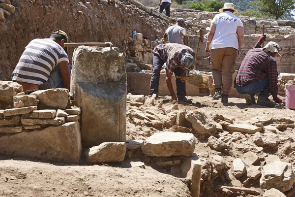Workers on the archaelogical excavation of Ephesus. Landmark in Turkey