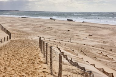 Bunkers in Arcachon bay sand beach. Aquitaine, France 