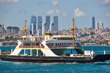 Comercial ferry traffic in the bosphorus strait. Istanbul cityscape. Turkey 