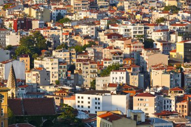 Istanbul city center buildings on the hill at sunset. Turkey