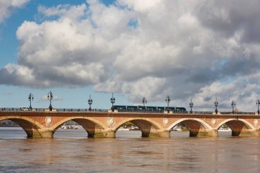 Historic bridge of Pont de Pierre. Garone river. Bordeaux, France
