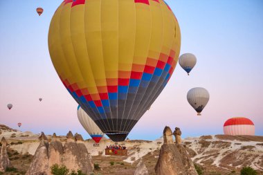 Balloons in rose valley, Cappadocia. Spectacular flight in Goreme. Turkey