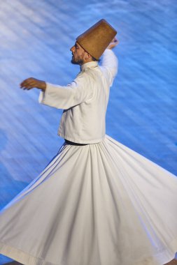 Dervish spirituality traditional ceremony in Mevlana culture center. Konya, Turkey