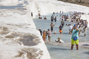 Pamukkale white mineral limestone natural pool. Tourism landmark in Turkey