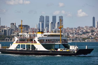 Comercial ferry traffic in the bosphorus strait. Istanbul cityscape. Turkey 