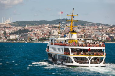 Tourist ferry in Bosphorus strait. Camlica mosque in Istanbul. Turkey clipart