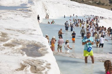Pamukkale white mineral limestone natural pool. Tourism landmark in Turkey