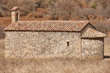 Santa Margarida chapel in La Garrotxa volcanic area. Girona, Spain clipart