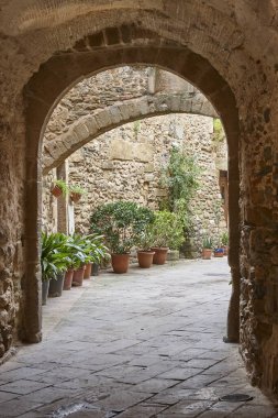 Picturesque medieval village of Monells. Girona, Costa Brava. Catalunya. Spain clipart
