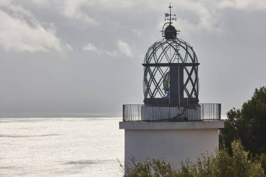 St. Sebastian lighthouse in Llafranc. Costa Brava. Girona, Catalonia. Spain clipart