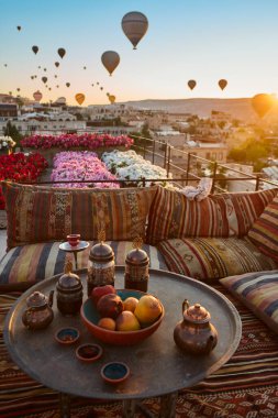 Balloons in rose valley, Cappadocia. Colorful sunrise in Goreme. Turkey