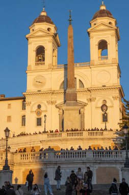 Trinita dei Monti church at sunset. Rome city center. Italy clipart