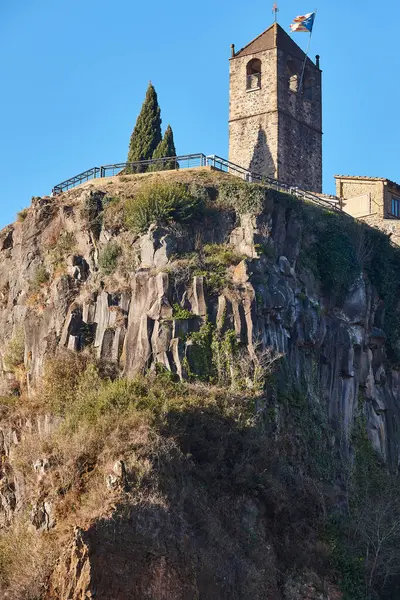 stock image Church over basalt rock. Castellfolit de la Roca. Girona, Spain