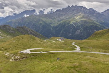 Grossglockner. Alpine serpentine mountain road. Landmark route in Austria clipart