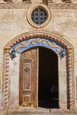 Antique greek colored doors in Mustafapasa village, Cappadocia. Turkey