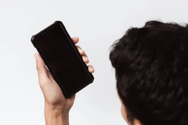 Stock image Asian person holding a mobile smartphone. Concept of communication technology.