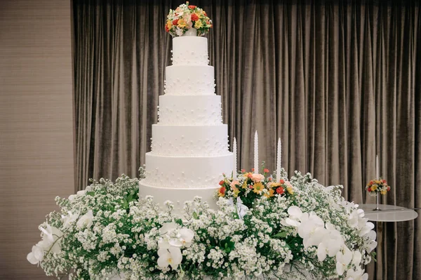 White wedding cake with flower