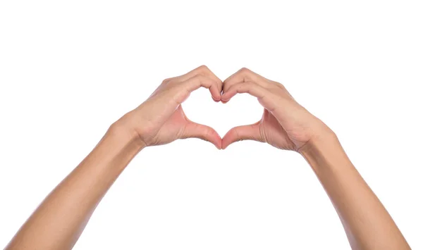 Woman hands making a heart shape on white isolated background