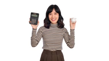 Portrait of young Asian woman holding white piggy bank and calculator isolated on white background, Financial and bank saving money concept